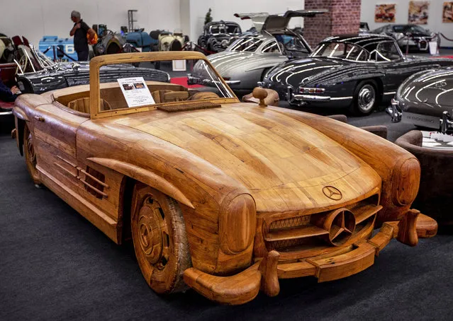 A Mercedes 300 SL Gullwing Roadster made of Teak wood is displayed at the IAA Auto Show in Frankfurt, Germany, Wednesday, September 11, 2019. (Photo by Michael Probst/AP Photo)