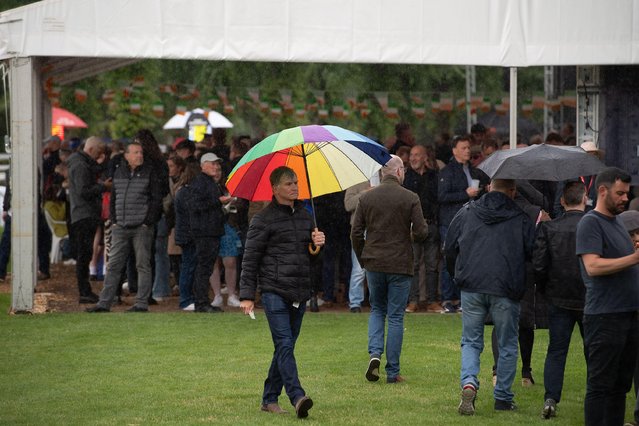 It was an evening of sunshine and showers on June 10, 2024, as racegoers enjoying horse racing at the Royal Windsor Racecourse Irish Night Monday Night Racing in Windsor, Berkshire, UK. (Photo by Maureen McLean/Alamy Live News)