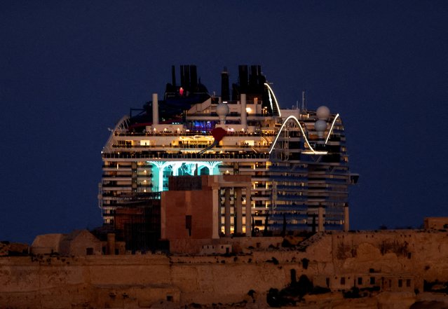 The MSC World Europa cruise ship passes behind Fort Ricasoli, where the ancient Rome set for Ridley Scott's film “Gladiator 2” is situated, as it departs from Grand Harbour in Valletta, Malta on December 27, 2023. (Photo by Darrin Zammit Lupi/Reuters)