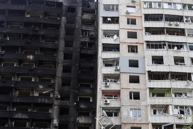 Damaged residential buildings are seen in Saltivka neighbourhood, amid Russia's attack on Ukraine, in Kharkiv, Ukraine on May 10, 2022. (Photo by Ricardo Moraes/Reuters)