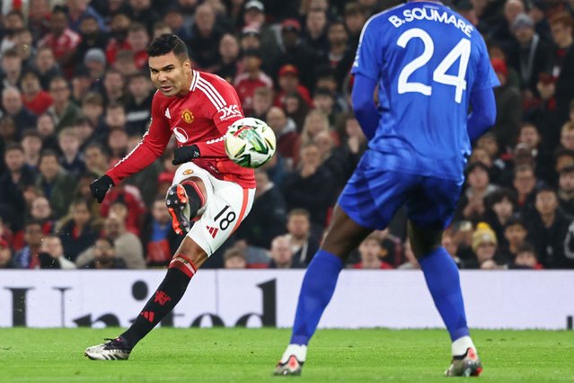 Manchester United's Brazilian midfielder #18 Casemiro shoots to score the opening goal of the English League Cup round of 16 football match between Manchester United and Leicester City at Old Trafford in Manchester, north west England, on October 30, 2024. (Photo by Darren Staples/AFP Photo)