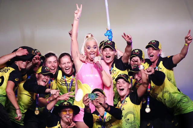 Katy Perry performs on stage with the Australian cricket team following their victory in the ICC Women's T20 Cricket World Cup Final match between India and Australia at the Melbourne Cricket Ground on March 08, 2020 in Melbourne, Australia. (Photo by Cameron Spencer/Getty Images)