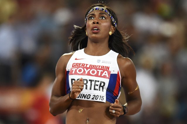 Tiffany Porter of Great Britain looks at the scoreboard after winning the women's 100 metres hurdles semi-final during the 15th IAAF World Championships at the National Stadium in Beijing, China August 28, 2015. (Photo by Dylan Martinez/Reuters)