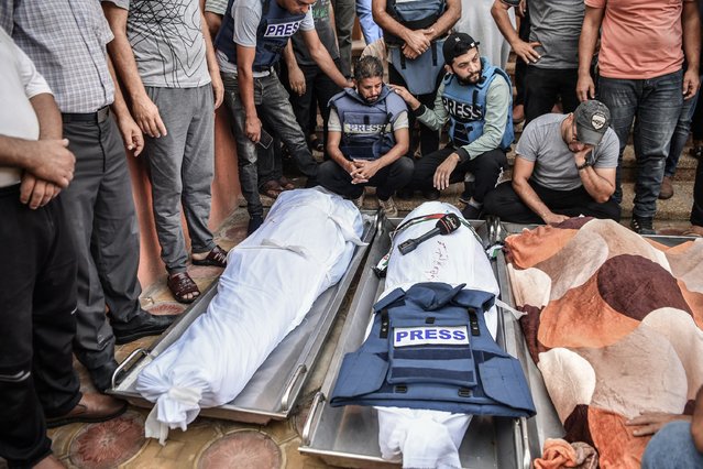 A funeral ceremony is held for Palestine TV correspondent Mohammed Abu Hatab, was killed, along with his family members, in an airstrike on his home in Khan Yunis, Gaza on November 03, 2023. Journalists attending the ceremony experienced sadness. (Photo by Abed Zagout/Anadolu via Getty Images)
