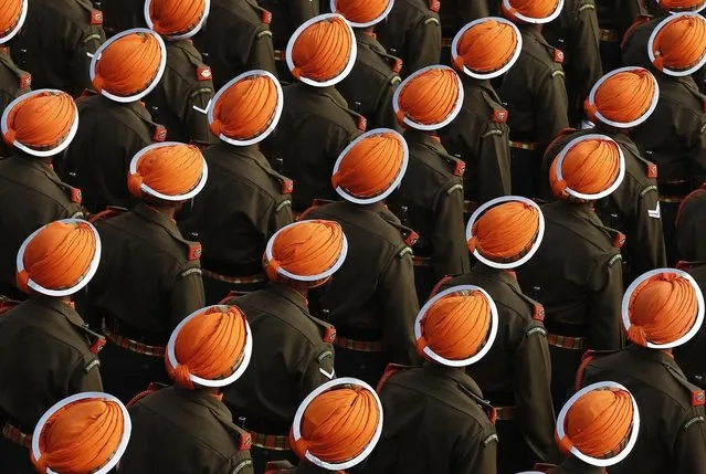 Indian Army soldiers march during the full dress rehearsal for the Republic Day parade in New Delhi January 23, 2014. (Photo by Adnan Abidi/Reuters)
