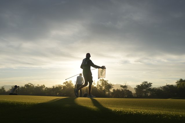 Matti Schmid, of Germany, rear, and his caddie look over a green during the first round of the Mexico Open golf tournament in Puerto Vallarta, Mexico, Thursday, February 20, 2025. (Photo by Fernando Llano/AP Photo)