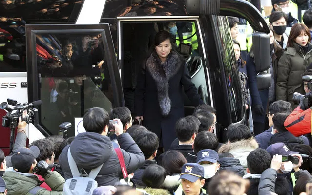North Korean Hyon Song Wol, head of a North Korean art troupe, gets off a bus as she arrives at the Seoul Train Station in Seoul, South Korea, Sunday, January 21, 2018. The head of a hugely popular girl band arrived in South Korea on Sunday across the rivals' heavily fortified border to check preparations for a Northern art troupe she also leads during next month's Winter Olympics in South Korea. (Photo by Kim Sun-ung/Newsis via AP Photo)