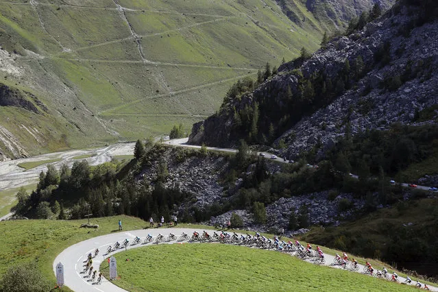 The pack climb Cormet de Roselend during the stage 18 of the Tour de France cycling race over 175 kilometers (108.7 miles) from Meribel to La Roche-sur-Foron, France, Thursday, September 17, 2020. (Photo by Thibault Camus/AP Photo)