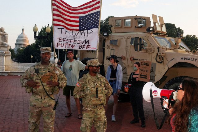 Protesters confront members of the National Guard patrolling Union Station with the U.S. Capitol building in the background, in Washington, D.C. on August 16, 2025. (Photo by Alex Kent/Reuters)