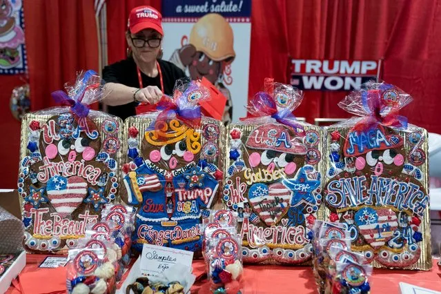 A vendor organizes cookies with symbols in support of former U.S. President Donald Trump at the Conservative Political Action Conference (CPAC) at Gaylord National Convention Center in National Harbor, M.D., March 2, 2023. (Photo by Sarah Silbiger/Reuters)