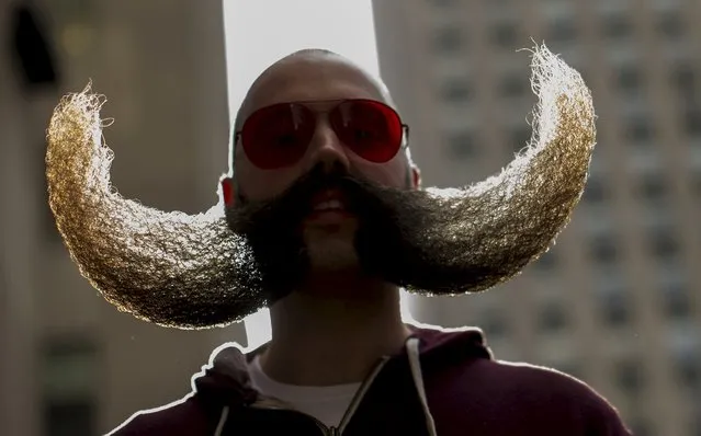 MJ Johnson gathers with other contestants to promote the National Beard and Moustache Championships in New York November 6, 2015. The National Beard and Moustache Championships will take place on November 7, 2015 in Brooklyn, New York and will feature contestants from all over the world. (Photo by Brendan McDermid/Reuters)