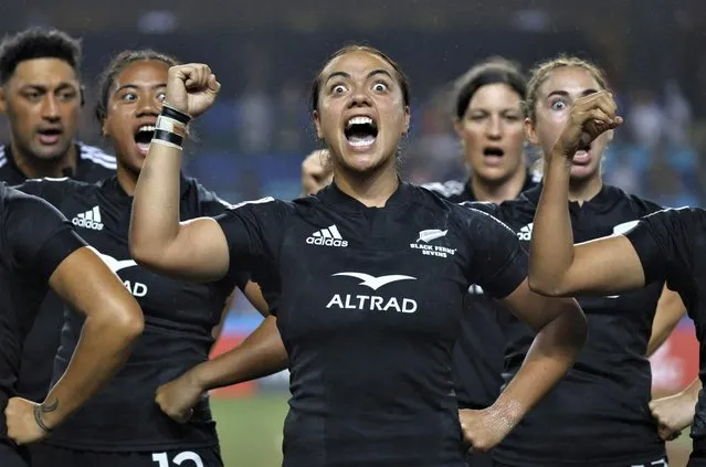 New Zealand celebrate winning the rugby union Sevens World Cup in Hong Kong after victory over Australia on April 2, 2023. (Photo by Tyrone Siu/Reuters)