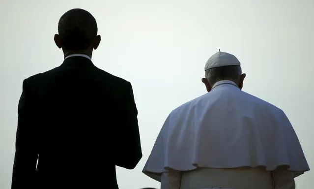 U.S. President Barack Obama (L) stands with Pope Francis during an arrival ceremony for the pope at the White House in Washington, United States September 23, 2015. (Photo by Jonathan Ernst/Reuters)