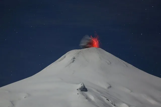 View of the Villarrica volcano taken from Pucon, some 800 kms south of Santiago, showing signs of activity on September 11, 2019. Villarrica Volcano is among the most active in South America. (Photo by Cristobal Saavedra Escobar/Reuters)