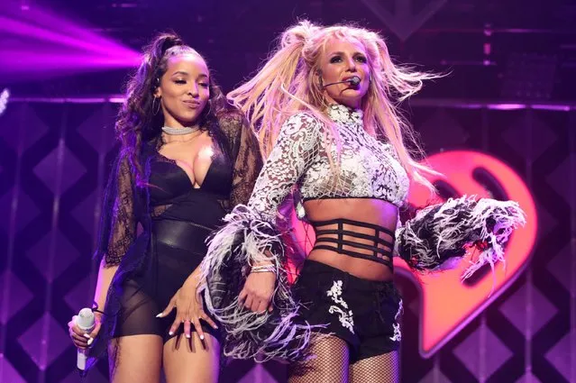 Singers Tinashe (L) and  Britney Spears perform at the 102.7 KIIS FM's Jingle Ball 2016 on December 02, 2016 in Los Angeles, California. (Photo by Christopher Polk/Getty Images for iHeartMedia)