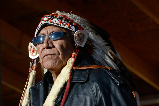 Arvol Looking Horse, spiritual leader of the Sioux nation, participates in a ceremony in Oceti Sakowin camp as “water protectors” continue to demonstrate against plans to pass the Dakota Access pipeline near the Standing Rock Indian Reservation, near Cannon Ball, North Dakota, U.S. December 4, 2016. (Photo by Stephanie Keith/Reuters)