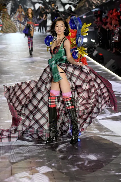 Liu Wen walks the runway during the 2018 Victoria's Secret Fashion Show at Pier 94 on November 8, 2018 in New York City. (Photo by Kevin Mazur/WireImage)