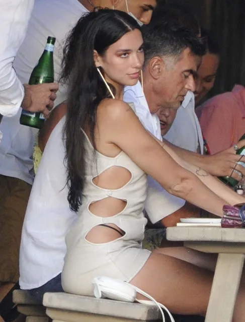 Multi-Award Winning British singer Dua Lipa and boyfriend Anwar Hadid spotted out for lunch with a group of friends during their Spanish holiday in Ibiza on August 5, 2021. (Photo by Backgrid USA)