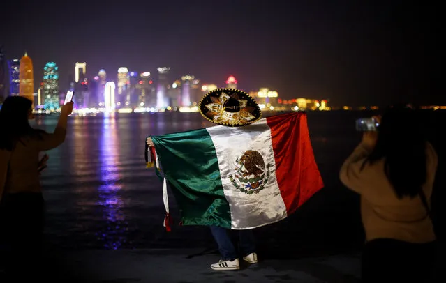 A Mexico fan is seen at the Corniche in Doha, Qatar on November 23, 2022. (Photo by Amanda Perobelli/Reuters)