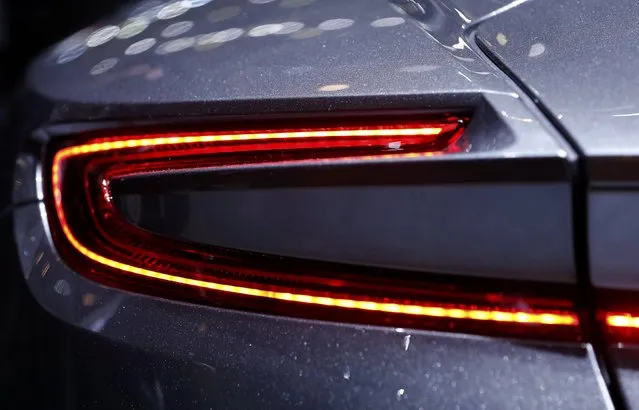 The tail light of the new Aston Martin DB11 is pictured at the 86th International Motor Show in Geneva, Switzerland, March 1, 2016. (Photo by Denis Balibouse/Reuters)