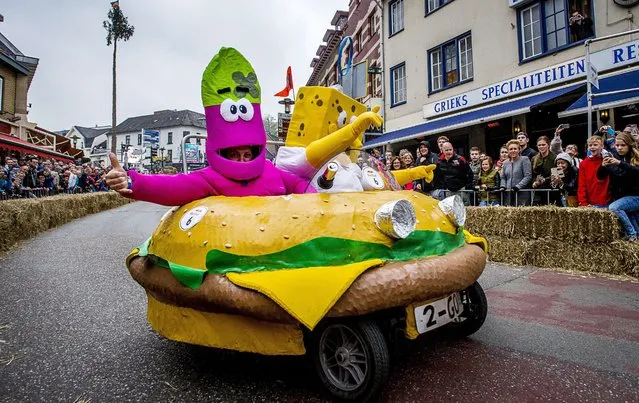 Participants attend the 20th edition of the “Belgian Pride”, a manifestation of lesbian, gay, bisexual and transgender oriented people, on May 16, 2015 in Brussels. (Photo by Laurie Dieffembacq/AFP Photo)