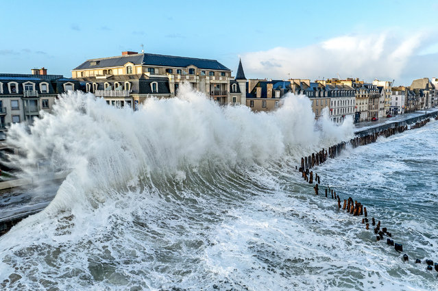 Waves to the height of 10m reaching 20-30m at the point of impact smashed against the coastline of the idyllic coastal city of Saint Malo, France on April 10, 2024. The extreme tidal waves were the result of Storm Pierrick. (Photo by Mathieu Rivrin/Solent News & Photo Agency)