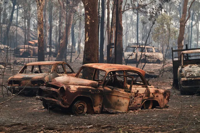 A burnt car on a vacant derelict property along Putty Road after devastating fires tore through areas near Colo Heights on November 14, 2019 in Sydney, Australia. Bushfires from the Gospers Mountain bushfire continue to burn. An estimated million hectares of land has been burned by bushfire following catastrophic fire conditions - the highest possible level of bushfire danger. While conditions have eased, fire crews remain on high alert as dozens of bushfires continue to burn. A state of emergency was declared by NSW Premier Gladys Berejiklian on Monday 11 November and is still in effect, giving emergency powers to Rural Fire Service Commissioner Shane Fitzsimmons and prohibiting fires across the state. (Photo by Brett Hemmings/Getty Images)