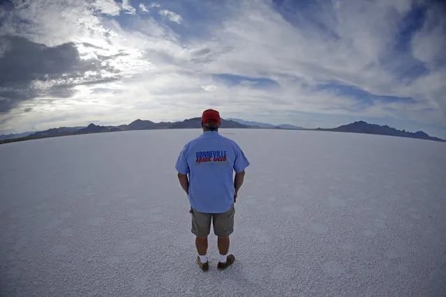 In this Monday, July 20, 2015 photo, Bill Lattin, the Southern California Timing Association president and Speed Week race director, stands in the Bonneville Salt Flats in Utah. (Photo by Rick Bowmer/AP Photo)