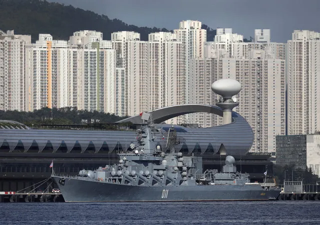 Russian Navy's Slava-class guided missile cruiser Varyag, the flagship of the Russian Pacific Fleet, is docked at Kai Tak Cruise Terminal for an unofficial five-day visit to Hong Kong, Monday, June 5, 2017. This is the first time for a Russian navy fleet to dock in the Chinese city. (Photo by Vincent Yu/AP Photo)