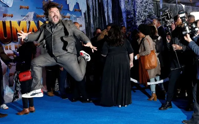 Cast member Jack Black jumps at the premiere for the film “Jumanji: The Next Level” in Los Angeles, California, U.S., December 9, 2019. (Photo by Mario Anzuoni/Reuters)