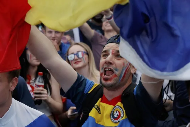 Football Soccer, France vs Romania, EURO 2016, Group A, Paris, France on June 10, 2016. A Romania soccer fan cheers at the fan zone in Paris. (Photo by Gonzalo Fuentes/Reuters)
