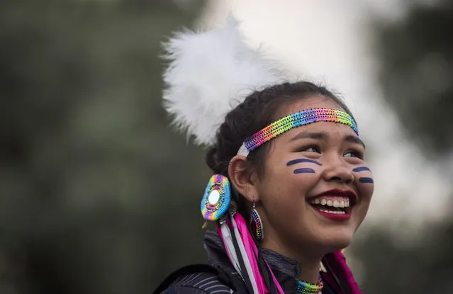 U16 volleyball player Tessa Erickson, of Team British Columbia, smiles ahead of the opening ceremony for the North American Indigenous Games in Toronto, Sunday, July 16, 2017. (Photo by Mark Blinch/The Canadian Press via AP Photo)