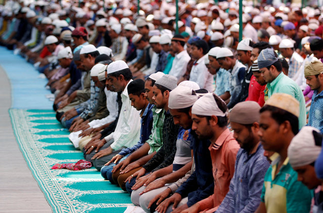 Muslims offer Friday prayers inside a mosque during the fasting month of Ramadan in Ahmedabad, India, June 24, 2016. (Photo by Amit Dave/Reuters)