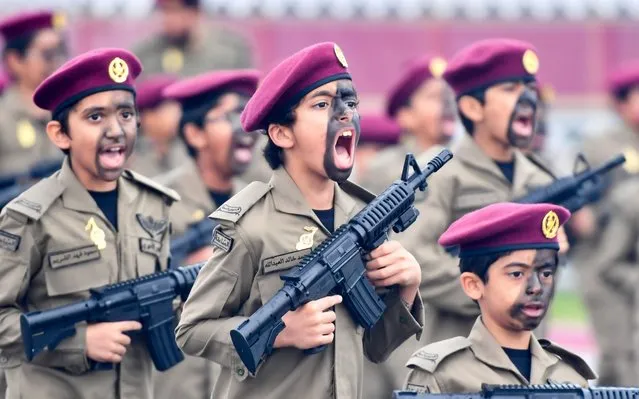 Qatari children dressed in Amiri Guard costumes participate in a military parade to mark Qatar's National Day, in Doha, Qatar, 18 December 2019. Qatar National Day marks Qatar's unification and independence in 1878 when Shaikh Jasim, the founder of the State, succeeded his father, Shaikh Muhammad Bin Thani, as the ruler and led the country towards unity. (Photo by Noushad Thekkayil/EPA/EFE/Rex Features/Shutterstock)