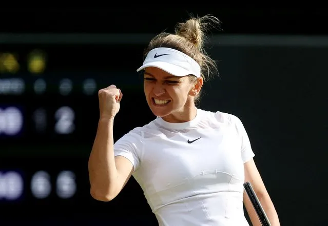 Romania's  Simona Halep celebrates winning her Ladies Singles Round of 16 Round match over Spain's Paula Badosa during day eight of The Championships Wimbledon 2022 at All England Lawn Tennis and Croquet Club on July 4, 2022 in London, England. (Photo by Paul Childs/Reuters)