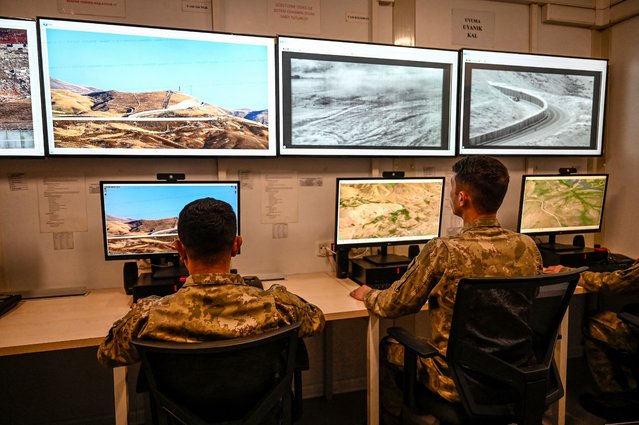 Turkish soldiers monitor the border in a military base at the border line between Turkey and Iran in Van, eastern Turkey, on November 1, 2024. (Photo by Ozan Kose/AFP Photo)