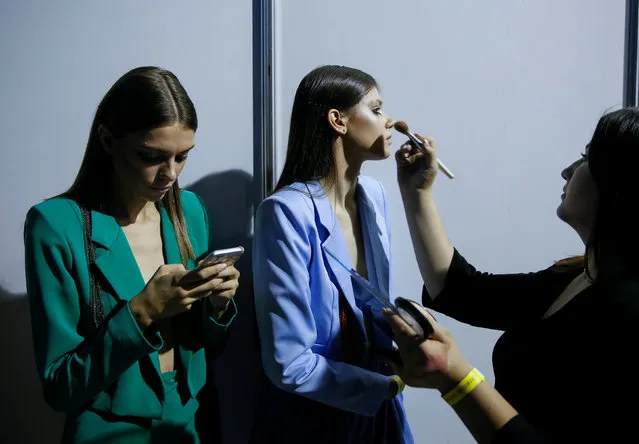 Models wait backstage during Ukrainian Fashion Week in Kiev, Ukraine, September 4, 2017. (Photo by Valentyn Ogirenko/Reuters)