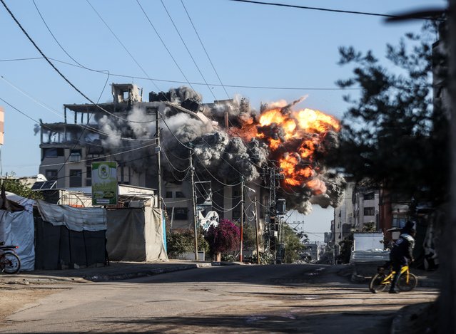 Smoke and dust rise from the al-Nasre apartment after the attack by the Israeli army on the apartment in the Nuseirat Refugee Camp in the central part of Gaza city, Gaza on November 28, 2024. (Photo by Ali Jadallah/Anadolu via Getty Images)