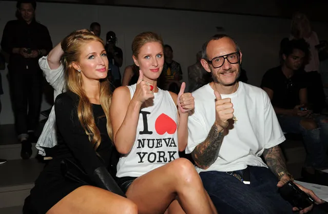 (L-R) Paris Hilton, Nicky Hilton and Terry Richardson attend the Jeremy Scott fashion show during MADE Fashion Week Spring 2014 at Milk Studios on September 11, 2013 in New York City. The renowned fashion photographer has long stood accused of sexual misconduct, yet scores of celebrity women in particular have continued to prop up his brand. (Photo by Craig Barritt/Getty Images)