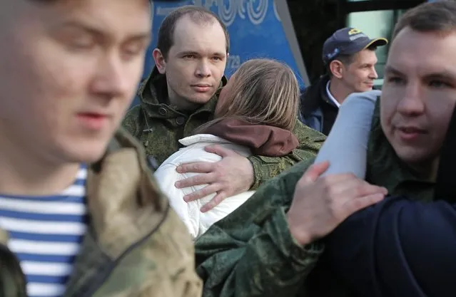 Russian conscripted men say goodbye to relatives at a recruiting office during Russia's partial military mobilization in Moscow, Russia, 05 October 2022. Russian President Putin announced in a televised address to the nation on 21 September, that he signed a decree on partial mobilization in the Russian Federation due to the conflict in Ukraine. Russian Defense Minister Shoigu said that 300,000 people would be called up for service as part of the move. (Photo by Maxim Shipenkov/EPA/EFE/Rex Features/Shutterstock)
