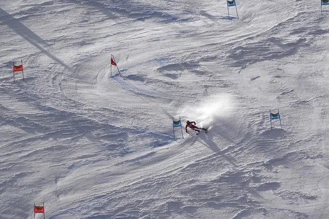 Switzerland's Marco Odermatt skis on his way to win an alpine ski, men's World Cup giant slalom, in Soelden, Austria, Sunday, October 23, 2022. (Photo by Giovanni Auletta/AP Photo)