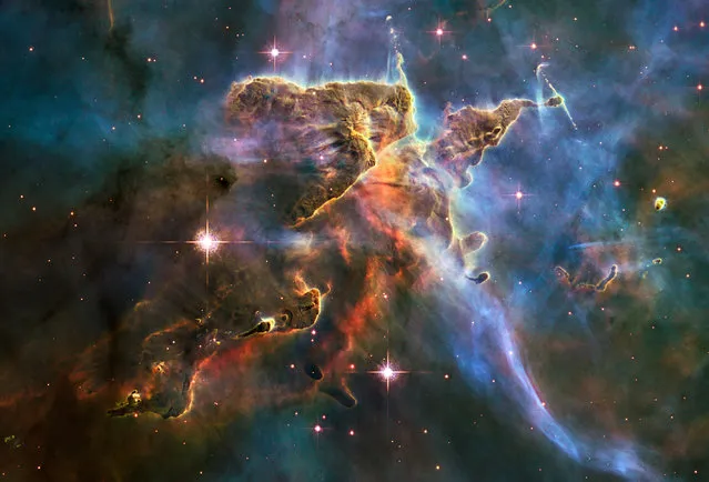 The tempestuous stellar nursery called the Carina Nebula, located 7,500 light-years away from Earth in the southern constellation Carina. (Photo by Reuters/NASA)