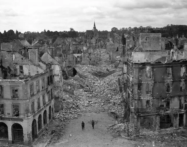 Falaise, the target for which allied forces in the Caen Sector have been aiming, has now fallen to the Canadians. Overhead view showing the shell and bomb shattered streets of Falaise in France, on August 18, 1944, as the Canadians found it. (Photo by AP Photo)