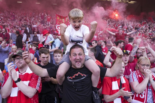 Liverpool soccer fans celebrate their team's victory against Tottenham Hotspur, clinching the Premier League title at Anfield in Liverpool, England, April 27, 2025. (Photo by Jon Super/AP Photo)