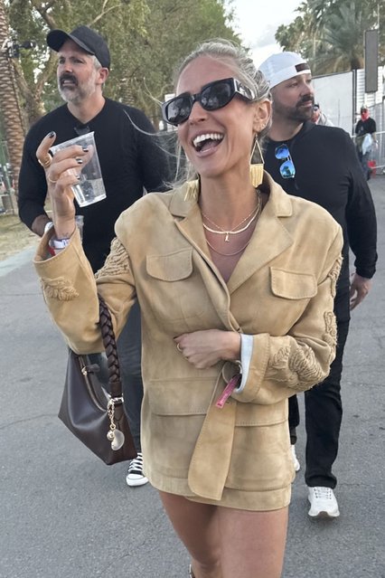 American TV personality and fashion designer Kristin Cavallari is seen smiling and having a drink while soaking in the lively atmosphere at Stagecoach in Indio, California on April 27, 2025. (Photo by Backgrid USA)