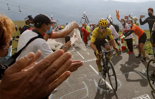 Slovenia's Primoz Roglic wearing the overall leader's yellow jersey, climbs the Loze pass during the stage 17 of the Tour de France cycling race over 170 kilometers (105 miles), with start in Grenoble and finish in Meribel Col de la Loze, Wednesday, September 16, 2020. (Photo by Christophe Ena/AP Photo)