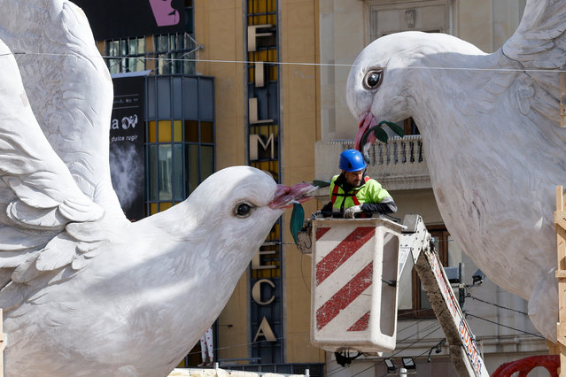 Part of a “fallas” sculpture installation, during preparations in Valencia, Spain, 13 March 2024. The main events of the Fallas festival run from 10 to 19 March ending with the burning of the “fallas” or figures on St. Joseph day. (Photo by Kai Försterling/EPA/EFE)