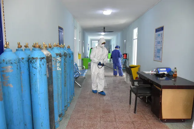 A medical worker conducts disinfection at a hospital in Mazar-i-Sharif, Afghanistan, on September 21, 2020. Afghanistan on Monday reported 30 new COVID-19 cases after health authorities conducted 165 tests within a day, bringing the number of total cases in the country to 39,074, including 32,576 who recovered from the virus, the country's Ministry of Public Health said. (Photo by Kawa Basharat/Xinhua News Agency via Getty Images)