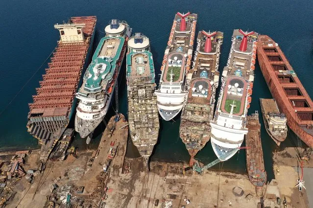 A drone image shows decommissioned cruise ships being dismantled  for scrap metal sales after the COVID-19 pandemic all but destroyed the industryat Aliaga ship-breaking yard in the Aegean port city of Izmir, western Turkey, October 2, 2020. (Photo by Umit Bektas/Reuters)