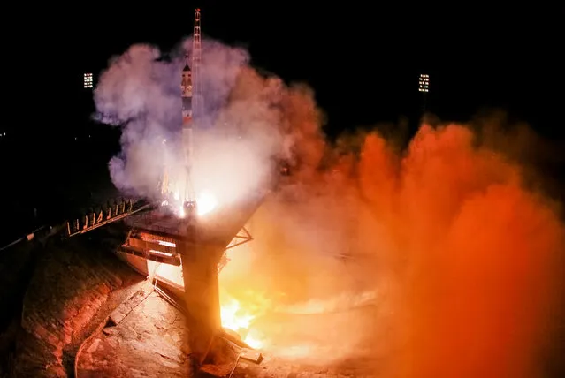 The Soyuz MS-08 spacecraft carrying the crew of astronauts Drew Feustel and Ricky Arnold of the U.S and crewmate Oleg Artemyev of Russia blasts off to the International Space Station (ISS) from the launchpad at the Baikonur Cosmodrome, Kazakhstan, March 21, 2018. (Photo by Shamil Zhumatov/Reuters)